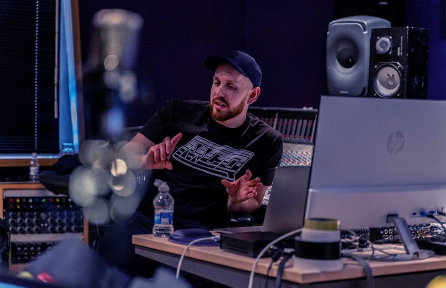 Sean D discussing a mix in the studio